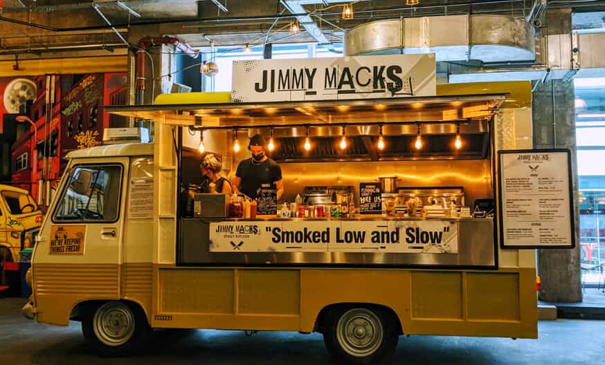 jimmy macks food truck with signage saying smoked low and slow